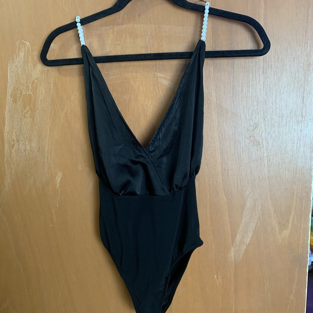 Black body suit with pearl straps